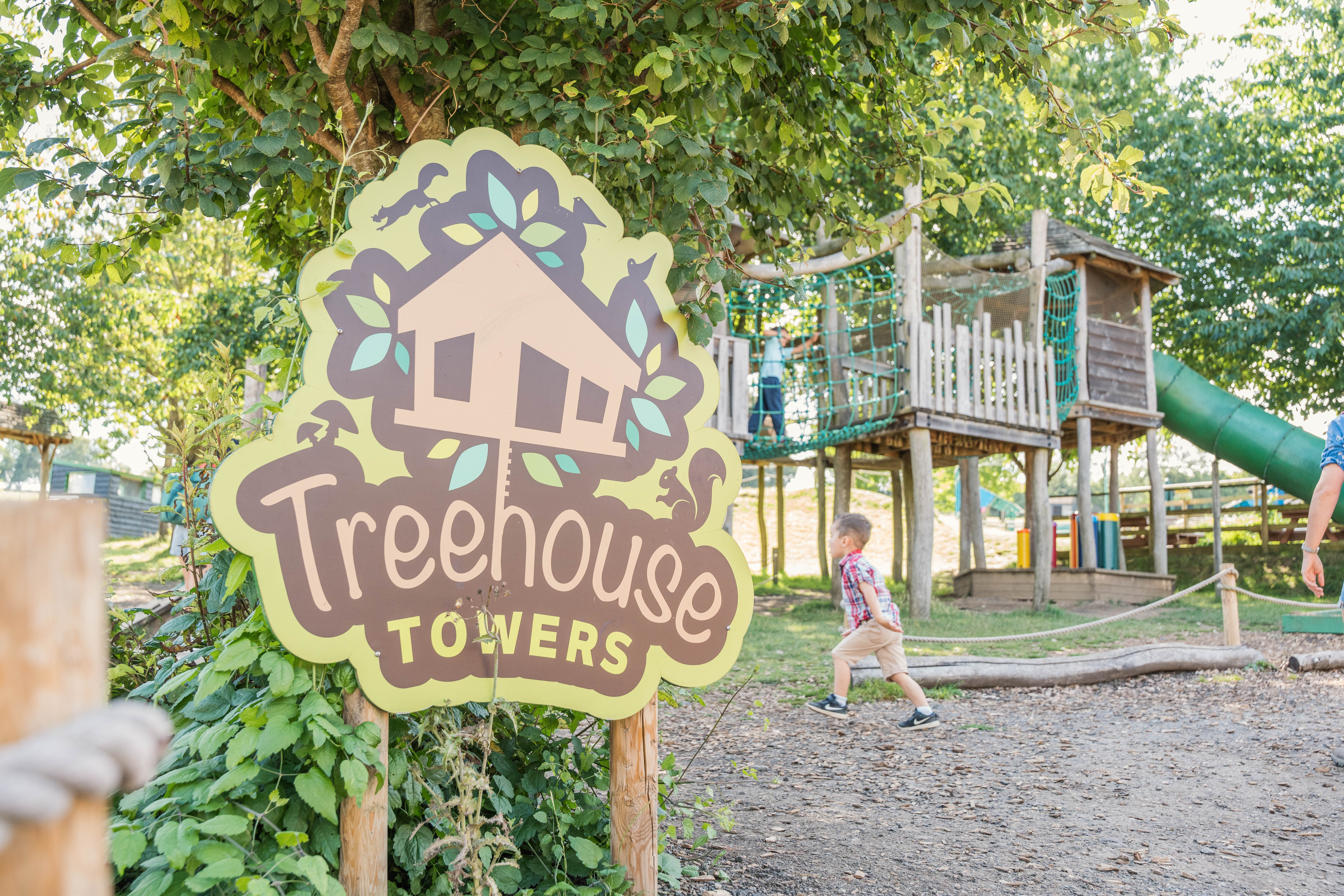 Treehouse Towers Sign