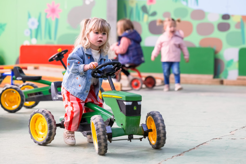 Young girl enjoying the tractor rides
