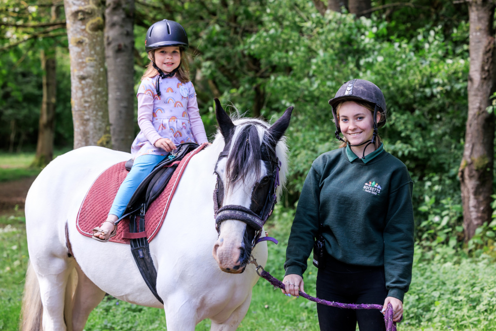 Enjoying a pony ride