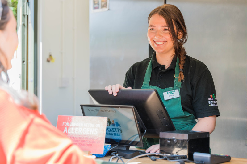 Staff member serving customer