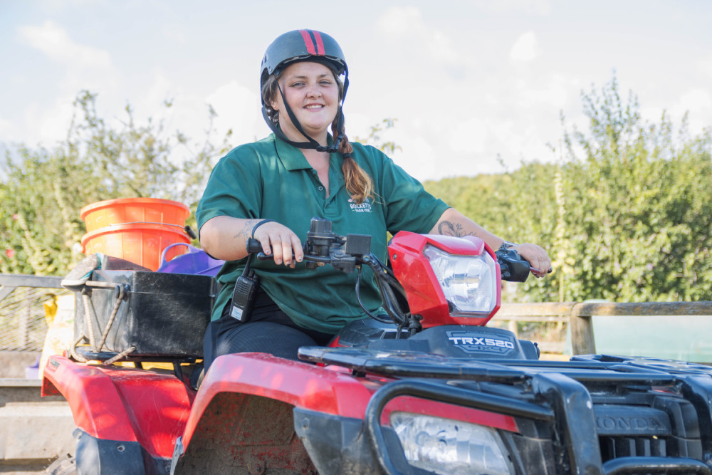 Staff driving on a quad bike