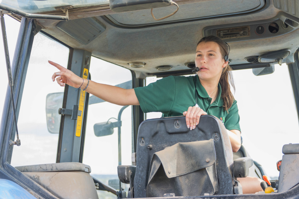 Staff member on a tractor ride